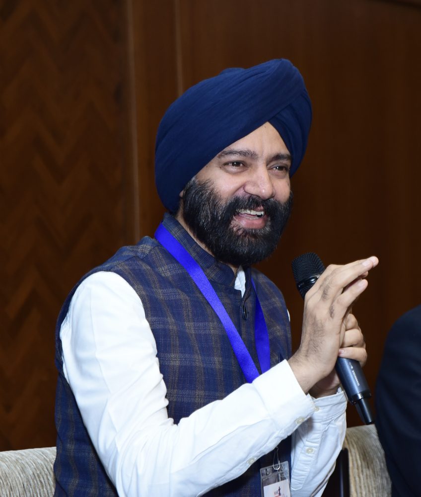 Harjeet Khanduja addressing an audience
